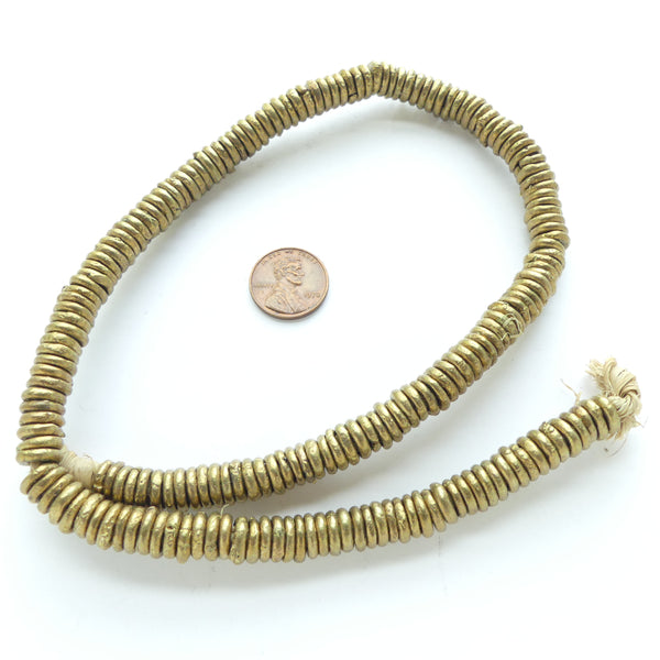 Brass Rings, from Nigeria, 9mm Diameter 2.5mm Thick on 18-inch Strand