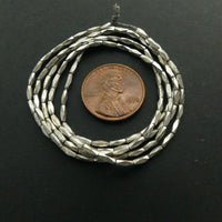 Thai Silver, Smooth Tiny Faceted Tubes, 4x1mm on 24-inch Strand