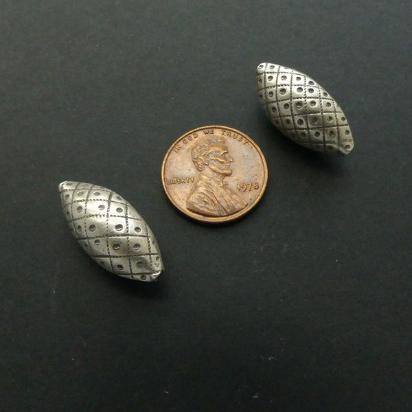 Thai Silver, Stamped Puffy Oval, 22x10mm. Sold individually