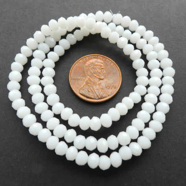 Faceted Glass, "Dragon Crystal" 3x4mm White Opaque on 16-inch Strands