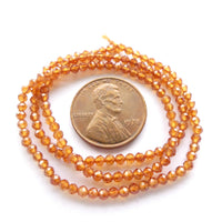 Hessonite, Faceted Round 2mm Beads on 14-inch Strands