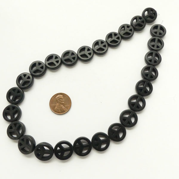 Magnesite Dyed Black, Peace Sign 15mm Diameter on 16-inch Strands