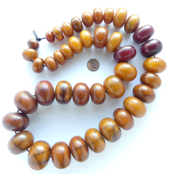 African Amber, Long Graduated Strand of Large Beads