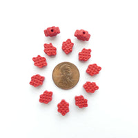 Cinnabar, Auspicious Knot Shape 7x10mm, Set of 12