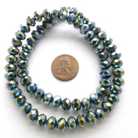 Faceted Glass "Dragon Crystal" 6x8mm, Green Iris Coating over Aqua, 16" Strands