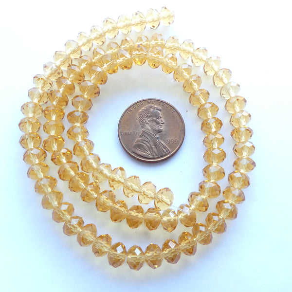 Faceted Glass "Dragon Crystal" 4x6mm, Amber, 16-inch Strand