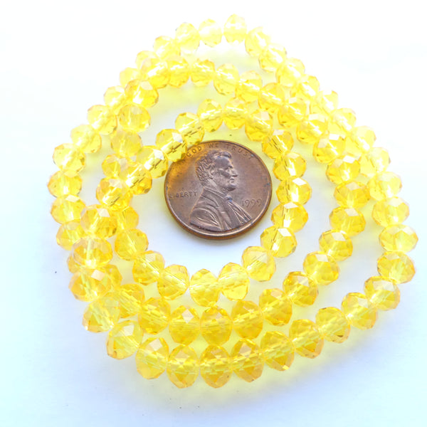 Faceted Glass "Dragon Crystal" 4x6mm, Translucent Yellow, 16-inch Strands