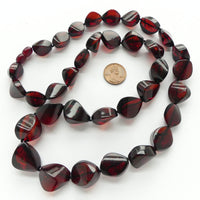 Amber Baltic, Red Smooth Baroque Shapes on 27-inch Necklace