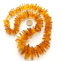 Amber, Chips, Large (5x15mm) to Huge (9x30mm) on 24" Strand with Clasp