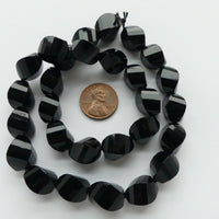 Black Onyx, Twisted Faceted Oval Beads, 15x10mm on 16-inch Strand