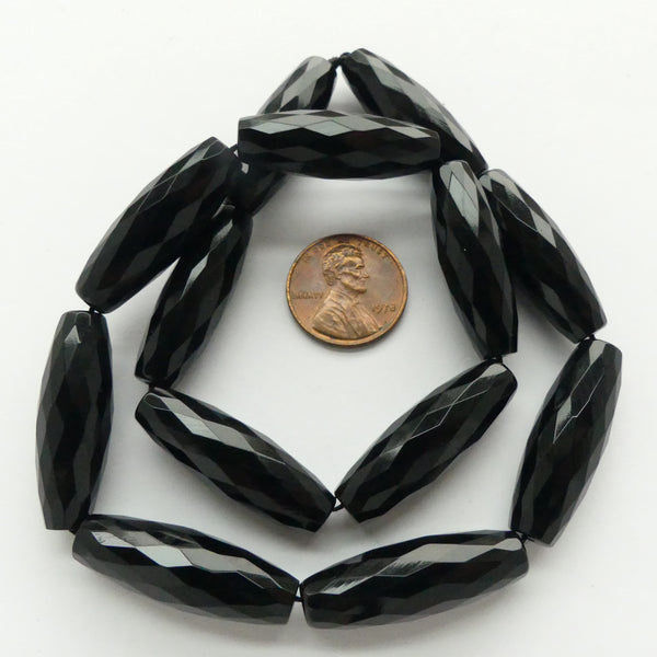 Black Onyx, Long Faceted Ovals, 30x10mm on 16" Strand