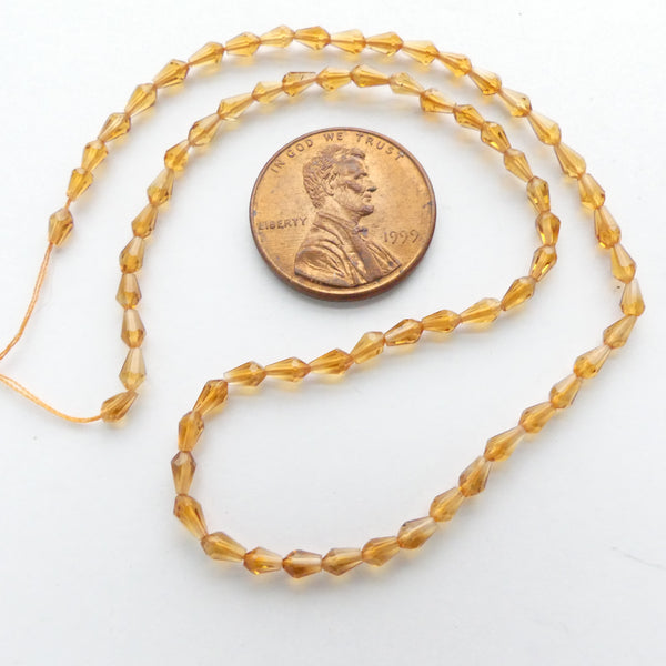 Citrine, Faceted Tiny Teardrops, 2x4mm on 15-inch Strands