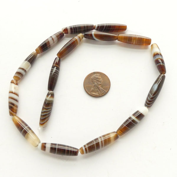 Banded Agate, Tibetan Ovals 25x7mm on 16-inch Strands