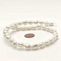 Pearls, White,  Baroque 10mm on 16-inch Strands