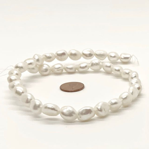 Pearls, White,  Baroque 10mm on 16-inch Strands