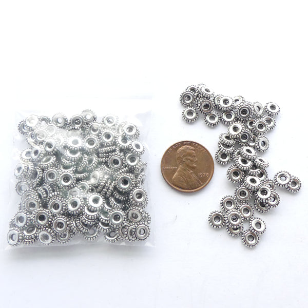 Cast Silver-tone Mix of Two Sizes of "Tires" 2x6mm and 3x8mm, Pkg of 30grams